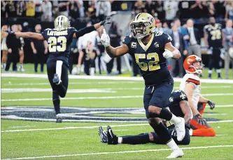  ?? BUTCH DILL THE ASSOCIATED PRESS ?? New Orleans Saints’ Craig Robertson (52) celebrates after Cleveland Browns kicker Zane Gonzalez, right, missed a field goal in the second half Sunday. The Saints won, 21-18. For more NFL coverage, visit our website.