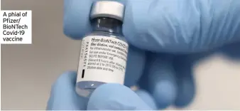  ??  ?? A phial of Pfizer/ Biontech Covid-19 vaccine