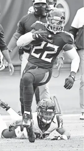  ?? GEORGE WALKER IV/TENNESSEAN.COM ?? Derrick Henry leaves Texans cornerback Vernon Hargreaves III behind during overtime on Oct. 18 at Nissan Stadium.