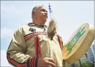  ?? Brian A. Pounds / Hearst Connecticu­t Media ?? Vincent Mann, chief of the Turtle Clan of the Ramapough Lunaape Nation, the resident tribe in the Stamford area during European settlement, beats a drum while singing in his native tongue at Stamford Day at Mill River Park on Sunday.