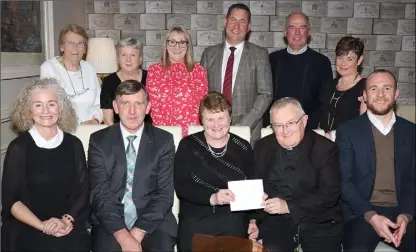  ??  ?? Back: Ursula Breen, Doreen Moran, Michelle Davitt, Donal Murphy, Seán Leacy and Frances Murphy. Front: Margaret Kelly, Tom Doyle, Alice Doyle, Fr Richard Redmond and principal Bobby Kenny at Alice’s retirement party in the Courtyard, Ferns.