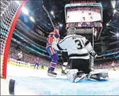  ?? Andy Devlin NHLI ?? EVAN BOUCHARD of the Oilers scores on David Rittich in a 4-2 win over the Kings on Monday night.