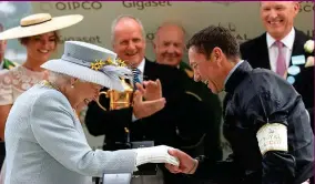  ?? PA ?? All smiles: Queen Elizabeth II greets Dettori last year