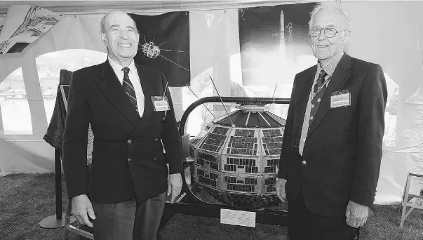  ?? Janice Lang/ Defence Research and Developmen­t Canada/ THE CANA DIAN PRESS ?? Alouette 1 satellite pioneers Dr. LeRoy Nelms and Dr. Colin Franklin with the spacecraft that launched Canada as a spacefarin­g nation 50 years ago.