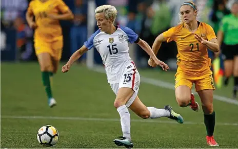  ??  ?? PHOTO: GETTY CLOSING THE GAP: Australia’s Ellie Carpenter closes in on American rival Megan Rapinoe during the Matildas win.