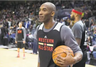  ?? Chris Young / Canadian Press ?? Kobe Bryant enjoys himself during practice with the Western Conference All-Stars. The Lakers star was voted in as a starter for his 18th and final All-Star Game.