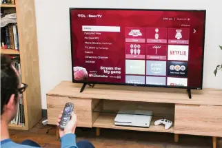  ?? SARAH TEW CNET/TNS ?? The TCL 4-Series features a Roku system built-in.