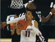  ?? JOHN LOCHER — THE ASSOCIATED PRESS ?? Arizona State’s Alonzo Verge Jr., who scored 26 points, eludes Washington State’s Noah Williams to take a shot.