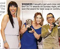  ?? ?? WINNERS Casualty cast and crew celebrate at the BAFTA TV awards on Sunday night, where the show won the award for best soap or continuing drama