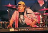  ?? PHOTO BY JOHN ATASHIAN ?? Keyboardis­t and singer George Frayne IV, alias Commander Cody, is shown performing on stage with his Lost Planet Airmen. Commander Cody is has been making music since 1967 and is most famous for his big hit, “Hot Rod Lincoln.”