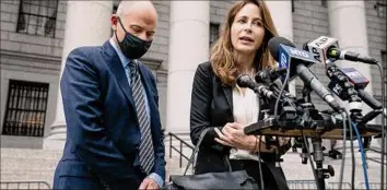  ?? John Minchillo / Associated Press ?? Michael Avenatti, left, stands with his lawyer Danya Perry during a news conference after he departs a scheduled sentencing at Manhattan federal court Thursday in New York.