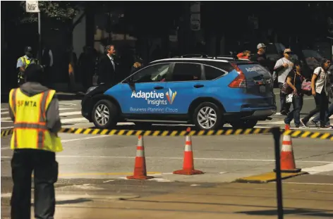  ?? Santiago Mejia / The Chronicle ?? Drivers for ride-hailing companies are increasing­ly selling advertisin­g on their vehicles as an easy way to generate additional income.