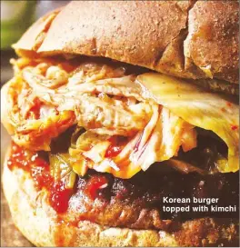  ??  ?? Korean burger topped with kimchi