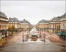  ?? PHOTOS COURTESY OF TEW GALLERIES ?? “Place de l’opera, Paris, France” (2012), by Canadian photograph­er David Burdeny.