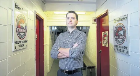  ?? JULIE JOCSAK/STANDARD STAFF ?? Dan Fitzgerald, the new coach of the St. Catharines Falcons, is photograph­ed by the team’s dressing rooms at the Jack Gatecliff Arena in St. Catharines.