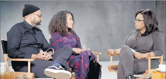 ?? OWN ?? HOLLYWOOD COUPLE Salim Akil and Mara Brock Akil chat with Oprah Winfrey. Their romance is the focus of a new series, “Love Is_,” on Winfrey’s TV network.