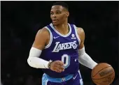  ?? ASHLEY LANDIS – THE ASSOCIATED PRESS ?? Russell Westbrook attended Friday night’s Summer League game, but he made no public acknowledg­ement of LeBron James, who sat in a different part of the arena.