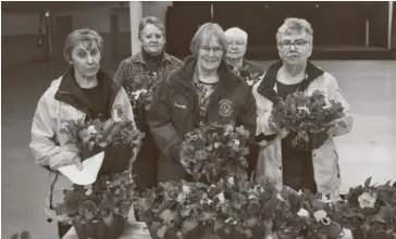  ?? Bill Atwood ?? The Woolwich Community Lions Club held its pansy sale at Lions Hall in Elmira Apr. 11, selling more than 200 pots. Taking part were Mary Ellen Townsend and Nancy Booth (back), and Dorothy Campbell, Jeanette Bomhof and Eileen Taylor. The sale will continue today ŠApril 18Œ at the Lions Hall from 11 a.m. to 7 p.m.