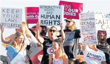  ?? ?? RALLY: People gather in Laguna Beach, California, to protest the Supreme Court ruling.