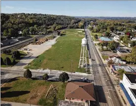  ?? CHUCK HAMLIN / SKY 7 ?? The intersecti­on of North Miami and West Central avenues — near the far end of the former Fraser Paper property — is where the main entrance is planned for a proposed $4.5 million volleyball facility that will include a restaurant and bar.