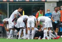  ??  ?? Bundle…Juwara is swamped by his team-mates after scoring v Inter