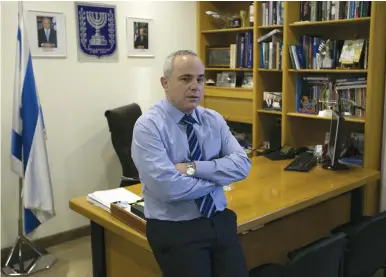  ?? (Ronen Zvulun/Reuters) ?? ENERGY MINISTER Yuval Steinitz in his office in Jerusalem.