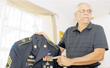  ?? ?? Ret. Army Sgt. 1st Class Melvin Morris of Port St. John waited 44 years to receive his Medal of Honor. Frederick Riefkohl, the first Puerto Rican to graduate from the Naval Academy, is one of 214 WWI minority veterans identified as possible Medal of Honor recipients.