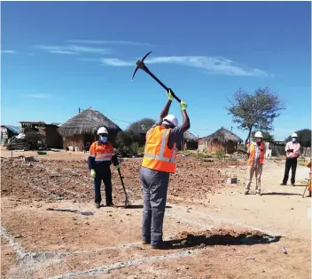  ??  ?? MDS MD doing the groundbrea­king with Specially elected Councillor Mr. Otsile Mmatlakgom­o