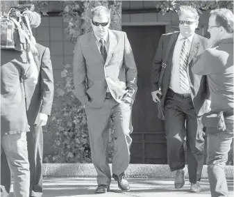  ??  ?? Kenneth Jacob Fenton arrives at the Western Communitie­s Courthouse for sentencing on Friday.