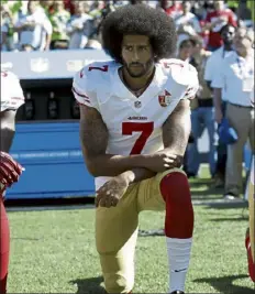  ??  ?? san Francisco 49ers quarterbac­k Colin Kaepernick kneels during the national anthem before a 2016 game against the seahawks in seattle. he has not found an nfl job the last three seasons.