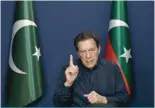  ?? ?? LAHORE: Former Pakistan’s Prime Minister Imran Khan gestures as he speaks during an interview. — AFP