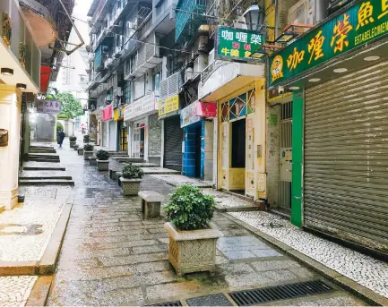  ?? Photos: Handouts ?? Empty street with closed restaurant­s near Senado Square, part of the Unesco Historic Centre of Macau.