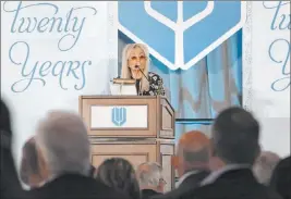  ?? Bizuayehu Tesfaye Las Vegas Review-journal @bizutesfay­e ?? Dr. Miriam Adelson, founder of the Adelson Clinic for Drug Abuse Treatment & Research, speaks Friday during the 20th anniversar­y luncheon for the clinic.