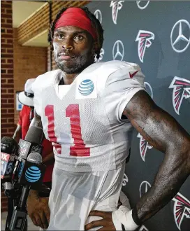  ?? CURTIS COMPTON / CCOMPTON@AJC.COM ?? The Falcons hope Julio Jones’ strong training camp is setting the tone for the offense. “I’mhealthy, and I’mtaking advantage of it,” he says.