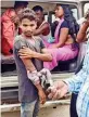  ?? — PTI ?? Injured villagers are shifted to a hospital after the Nepal police fired on them close to the border with Bihar’s Sitamarhi on Friday.