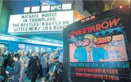  ?? Photograph­s by Kena Betancur AFP / Getty Images ?? MOVIEGOERS line up for the debut of a surprise documentar­y, “Trumpland.”