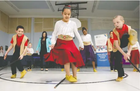  ?? MICHELLE BERG ?? The Little Prairie Steppers Kyle Pritchard, from left, Mataya Laprise and Syris Quiring perform at the Metis Pride Open Door Society festival at the Saskatoon Indian and Métis Friendship Centre in 2015. Cultural commonalit­y can bring people together, writes Ali Abukar.