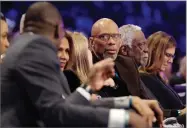  ?? CHUCK BURTON AP PHOTO BY ?? Former NBA player Kareem Abdul-jabbar, center, speaks with Dominque Wilkins, left, as former player Bill Russell is seen at right, during the NBA Allstar skills session basketball contest, Saturday, Feb. 16, in Charlotte, N.C.