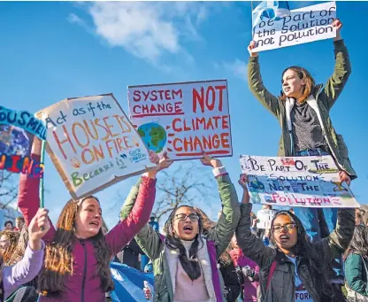  ?? Picture: Getty. ?? Young climate change protesters outside the Scottish Parliament.