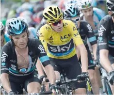  ?? — AFP ?? (From left) Italy’s Fabio Aru, Belarus’ Vasil Kiryienka, Great Britain’s Christophe­r Froome, wearing the overall leader’s yellow jersey, and Great Britain’s Luke Rowe ride during the 146,5 km twentieth stage of the Tour de France.