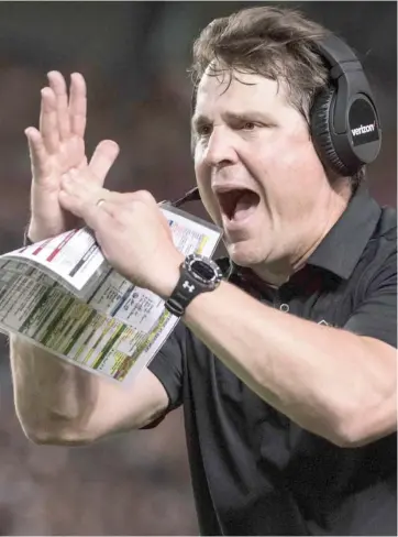  ?? (Photo by Sean Rayford, AP file) ?? South Carolina head coach Will Muschamp calls for a timeout during the first half of a game earlier this season.