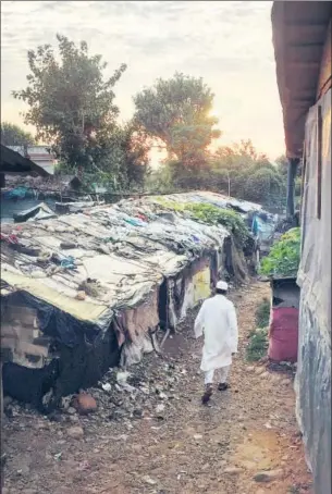  ?? MASIH & NITIN KANOTRA/HT PHOTOS NIHA ?? (Above) A view of the Rohingya camp in Jammu. (Above left) A family at their makeshift hut in the settlement. There are about 5,700 Rohingya refugees living in Jammu.