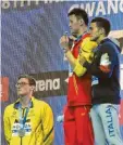  ?? Foto: Getty Images ?? Keine Lust: Mack Horton (li.) boykottier­t die Siegerehru­ng mit Sun Yang (Mitte) und Gabriele Detti.