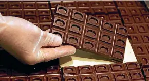  ?? MAARTEN HOLL ?? Dopamine is produced when we eat chocolate, and this can have a mood lifting effect on many people.