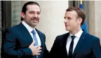  ?? (Reuters) ?? FRENCH PRESIDENT Emmanuel Macron (right) and Saad Hariri are seen at the Elysee Palace in Paris on Saturday.