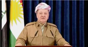  ?? — Reuters ?? Downcast: Barzani giving a televised speech in Irbil, Iraq.