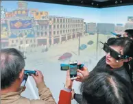  ?? PROVIDED TO CHINA DAILY. ?? People use the augmented reality