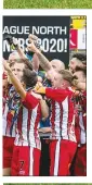  ??  ?? JAKE’S JOY: Alty skipper Jake Moult lifts the trophy after his side held their nerve in the final