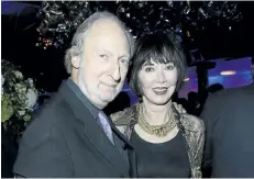  ?? THE ASSOCIATED PRESS FILES ?? Literary agent Ed Victor, left, and Carol Victor pose at a book launch party. Ed Victor died of a heart attack on Wednesday.