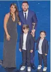  ?? — AFP ?? Messi with his wife Antonella Roccuzzo and their children at the award function.